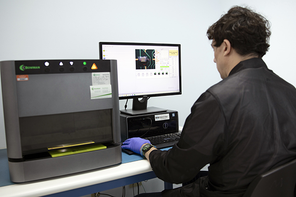 A lab technician is testing a component with a Bowman machine